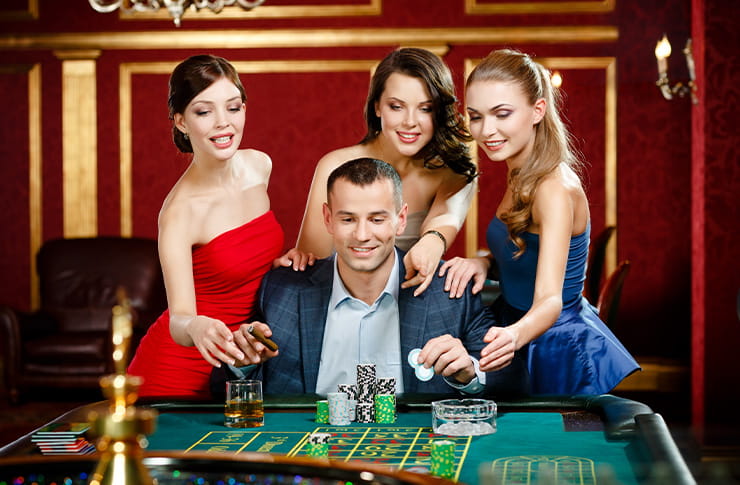 People Playing On a Casino Table