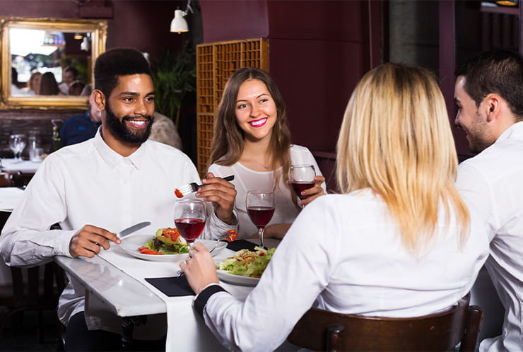 Two Couples Dining on a Table at Cache Creek Casino