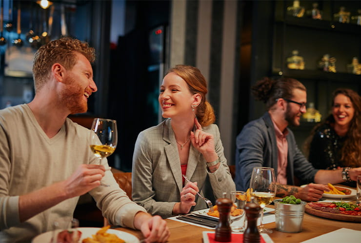 Man and Woman Drinking and Smiling