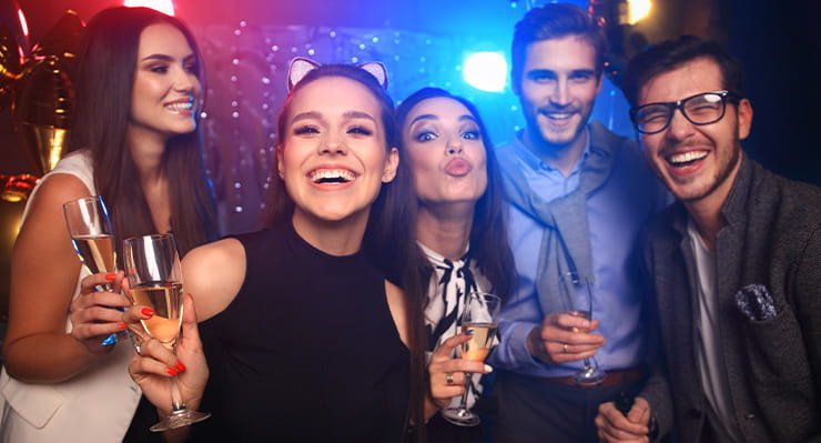 Party People Posing for a Picture at a Harrahs Club