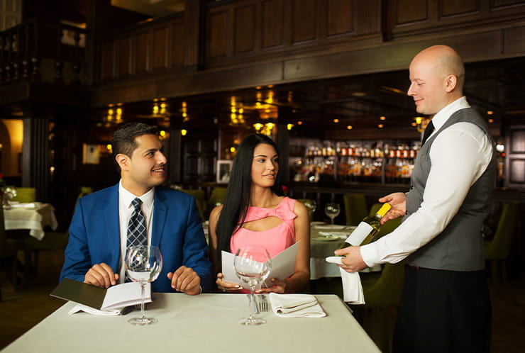 A Couple Ordering Dinner at Rolling Hills Restaurant