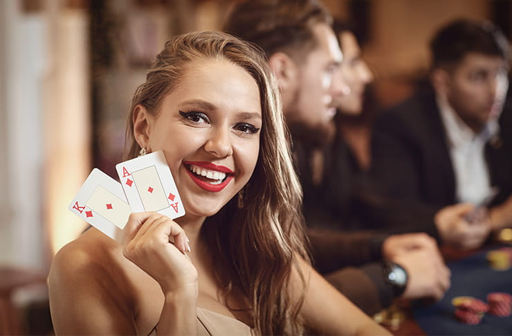 A Woman at a Blackjack Table Holding Ace and King